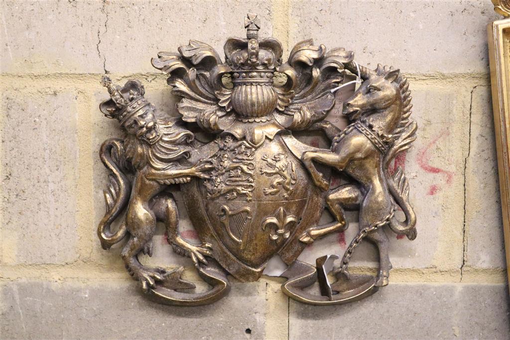 A gilt composition coat of arms, 35 x 33cm